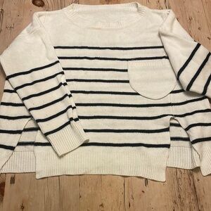 Black and White striped sweater.
